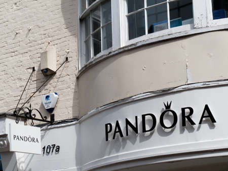 Pandora jewellers name above retail store, international Danish jewellery manufacturer and retailer founded in 1982のeditorial素材