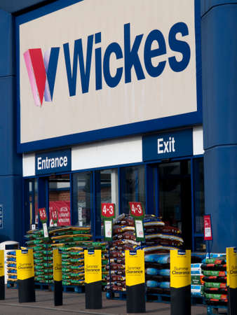 Wickes sign above entrance, British home improvement retailer, sales of supplies and material to the public and the building tradeのeditorial素材