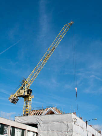 Construction site tower crane over building developmentのeditorial素材