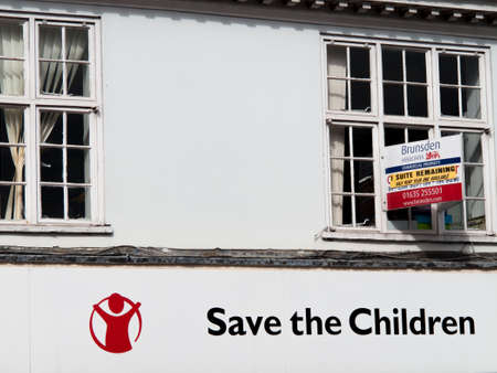 Save the Children name over charity shop, international organisation that promotes the rights of childrenのeditorial素材