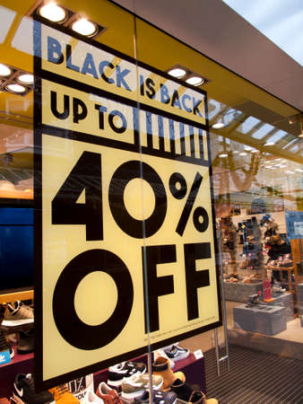 Salisbury, Wiltshire, England - November 24, 2017: Black Friday signs in high street stores advertising price discountsのeditorial素材