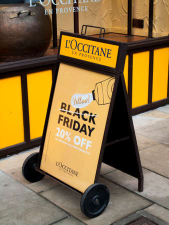 Salisbury, Wiltshire, England - November 24, 2017: Black Friday signs in high street stores advertising price discountsのeditorial素材