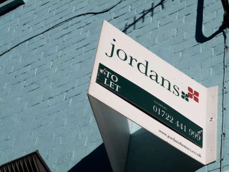 Commercial vacant shop to let sign over retail unitのeditorial素材