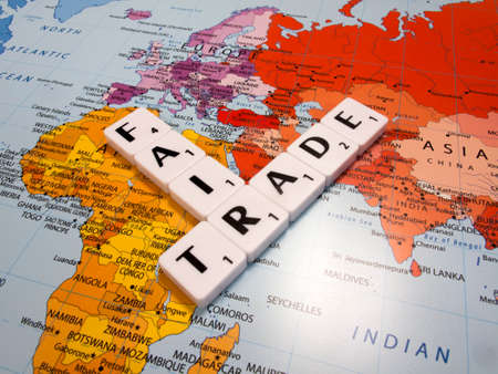 representation of fair trade, to help producers in developing countries achieve better trading conditions, on world map backgroundのeditorial素材