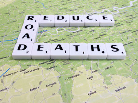 reduce road deaths message on London map background