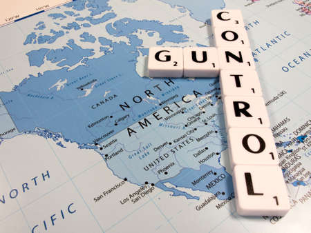 representation of gun control in the United States of America with USA map backgroundのeditorial素材