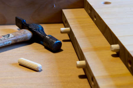 Self assembly bookcase pine flat pack furniture being assembled