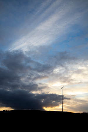 Autumn sunset over farmland field in the rural county of Hampshireの写真素材