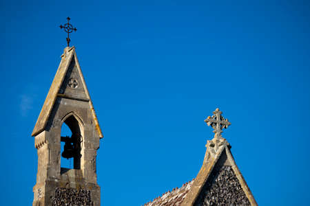Christian medieval church structure against a clear sky