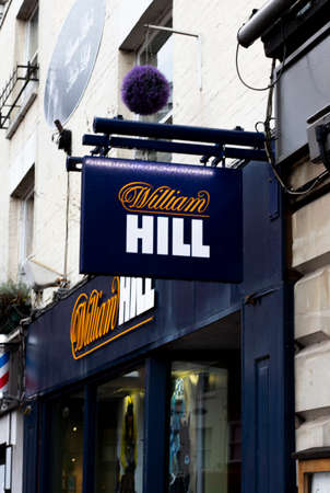 William Hill bookmakers sign, company founded by William Hill in 1934 at a time when gambling was illegal in Britainのeditorial素材