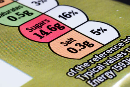 Salt content information displayed on food packaging label with shallow depth of fieldの写真素材