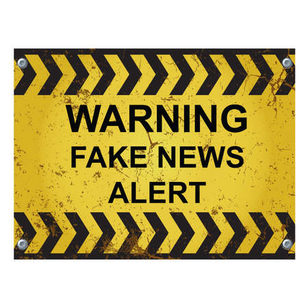 Warning fake news alert sign relating to the spread of disinformation on traditional news and social media isolated on white backgroundの写真素材