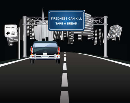 Tiredness can kill warning sign to motorist on overhead road gantry with vehicle entering generic cityの写真素材