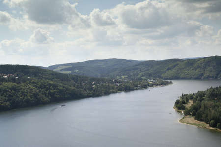 Stream of lake and cloudy skyの写真素材