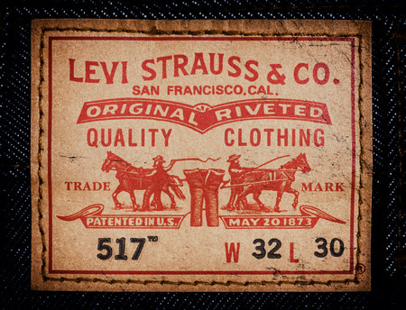 LEVI'S leather label on the blue jeans. LEVI'S is a brand name of Levi Strauss and Co, founded in...