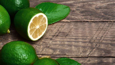 Juicy lime on a wooden backgroundの写真素材