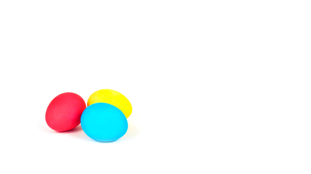 Colorful festive easter eggs on white backgroundの写真素材