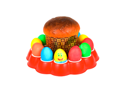 Colorful festive easter eggs and cake on white backgroundの写真素材