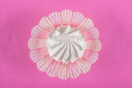 Homemade zephyr or marshmallow on pink background の写真素材