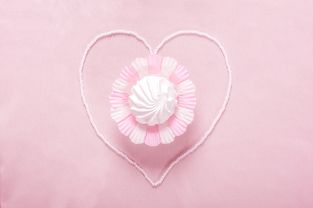 Homemade zephyr or marshmallow on pink background の写真素材