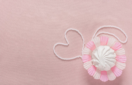 Homemade zephyr or marshmallow on pink backgroundの写真素材
