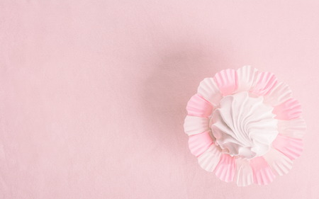 Homemade zephyr or marshmallow on pink background の写真素材