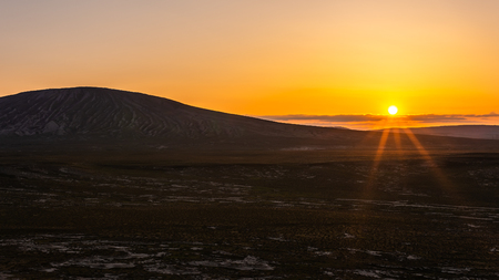 Great volcano at colorful sunsetの写真素材