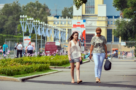 Russia, Moscow, May 11, 2018. Walking people on exhibition complex VDNHのeditorial素材