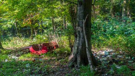 Forest pollution by garbage wasteの写真素材