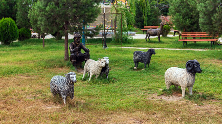 Khachmaz, Azerbaijan - September 02. 2018. Sculptures in the city park, shepherd and sheepsのeditorial素材