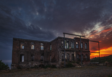 Exterior of old ruined ghost houseの写真素材