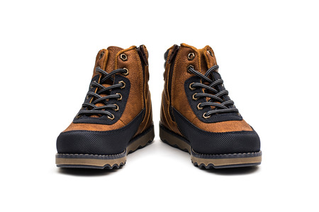 Children winter boots on a white backgroundの写真素材