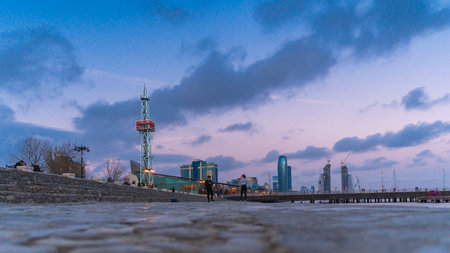 Azerbaijan, Baku, February 24, 2019 Youth walk along the embankment
