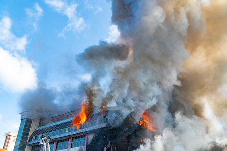 Burning building in thick smokeのeditorial素材