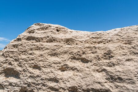 Huge boulder against the blue skyの写真素材