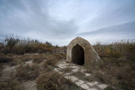 Old abandoned well in the courtyard of the caravanserai, located in Azerbaijanの写真素材