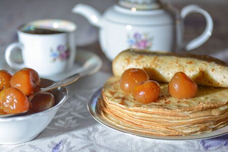 Pancakes on a plate with fig jamの写真素材