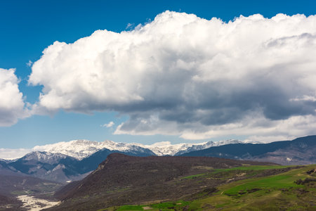 Mountain landscape with thick clouds