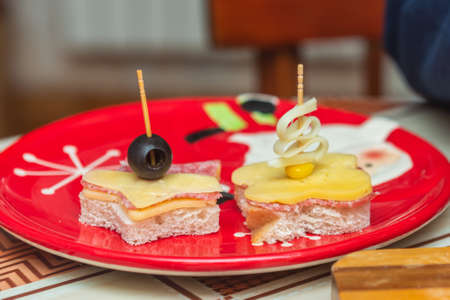 Sandwiches with cheese on a plateの写真素材