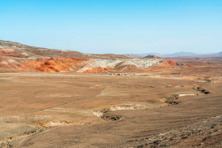 Small farm at the foot of the mountainsの写真素材
