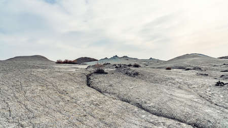 Landscape with mud volcanoes in the mountainsの写真素材