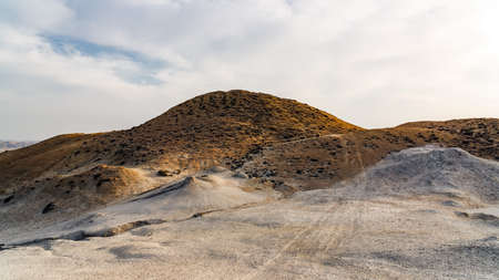 Landscape with mud volcanoes in the mountainsの写真素材