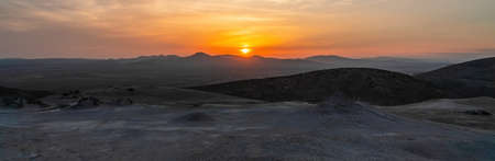 Panoramic view of the mud volcano at sunset timeの写真素材