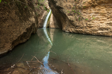 Small beautiful waterfall in the mountainsの写真素材