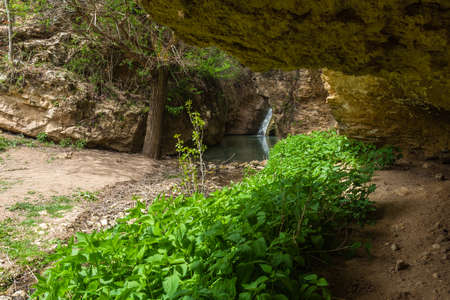 Small beautiful waterfall in the mountainsの写真素材