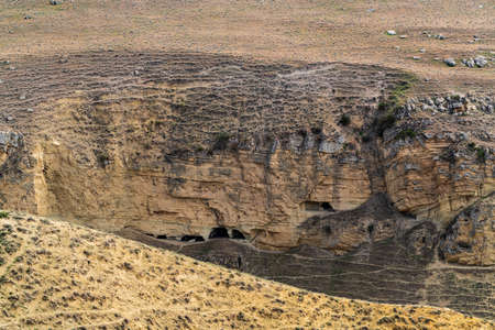 Ancient caves in the mountainの写真素材