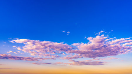Bright colorful sunset sky backgroundの写真素材