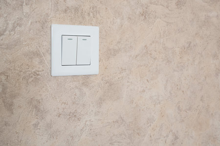 Light switch on the wallの写真素材