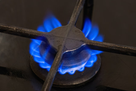 Gas cooker with burning flames of propane gas.Gas crisis and high priceの写真素材