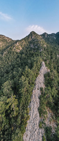 Panorama of countryside in mountain.Green forest on the hills, cliffs